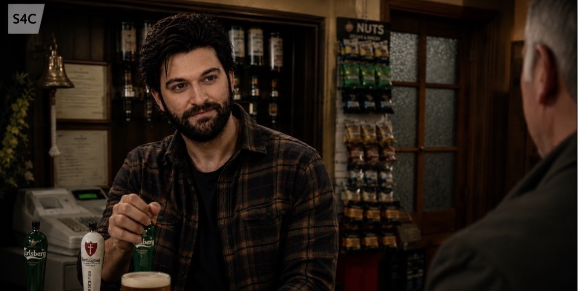 Daniel Broderick pulling a pint in a bar scene for S4C
